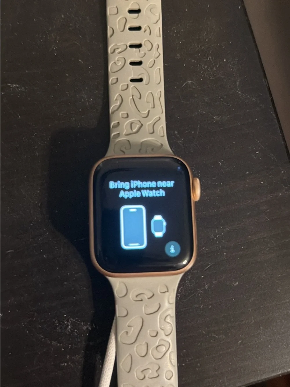 Apple Watch Series 5 with Light Gray Textured Sport Band - rose Gold